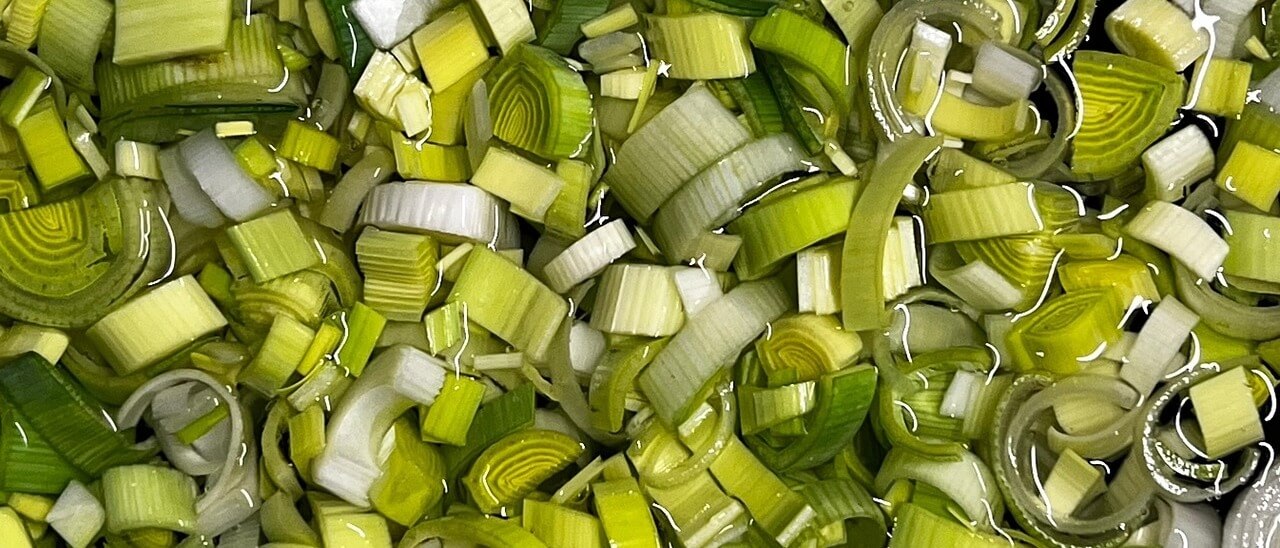 Chopped, green leek tops.